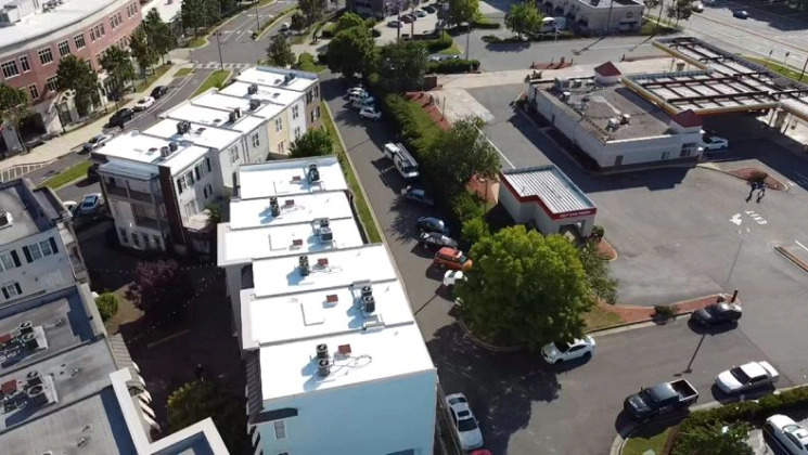 service commercial roofing work aerial view